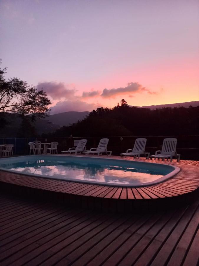 Aconchego Itaipava Hotel Bagian luar foto